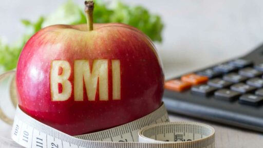 BMI - measuring tape and calculator, diet and healthy weight