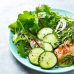 Keto diet meal. mixed salad with fish