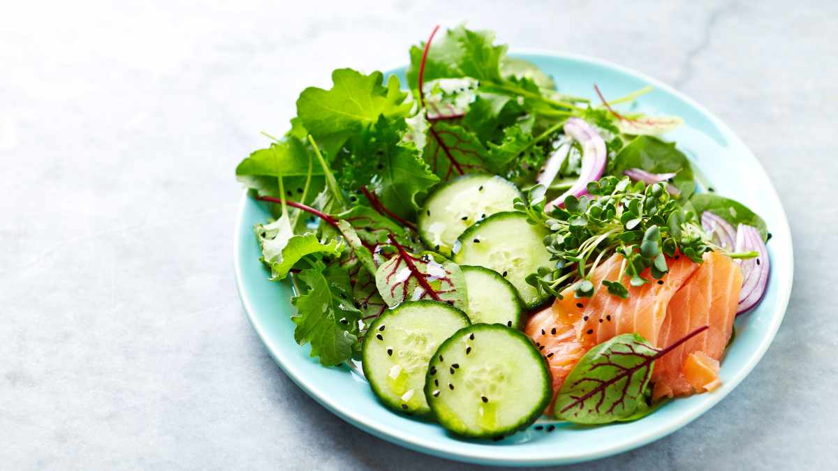 Keto diet meal. mixed salad with fish