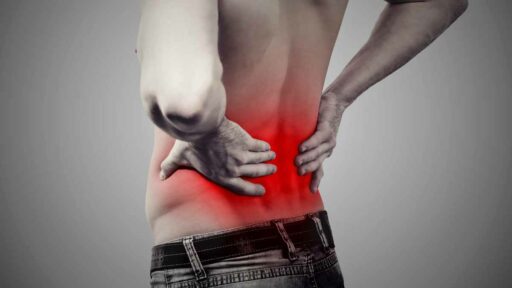 Young man with lower back pain