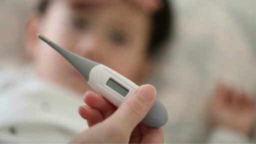 digital thermometer ready for fever measurement