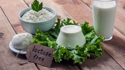 lactose intolerance - lactose free food with background
