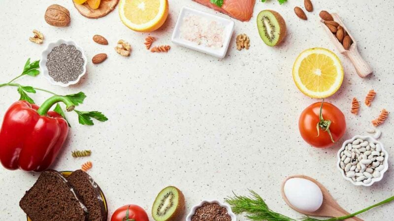 Low fodmap diet ingredients - seafish, vegetables and fruits, nuts, greens, beans