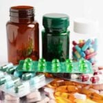 flaconi capsule e compresse illustrative di soluzioni farmacologiche per antinfiammatori